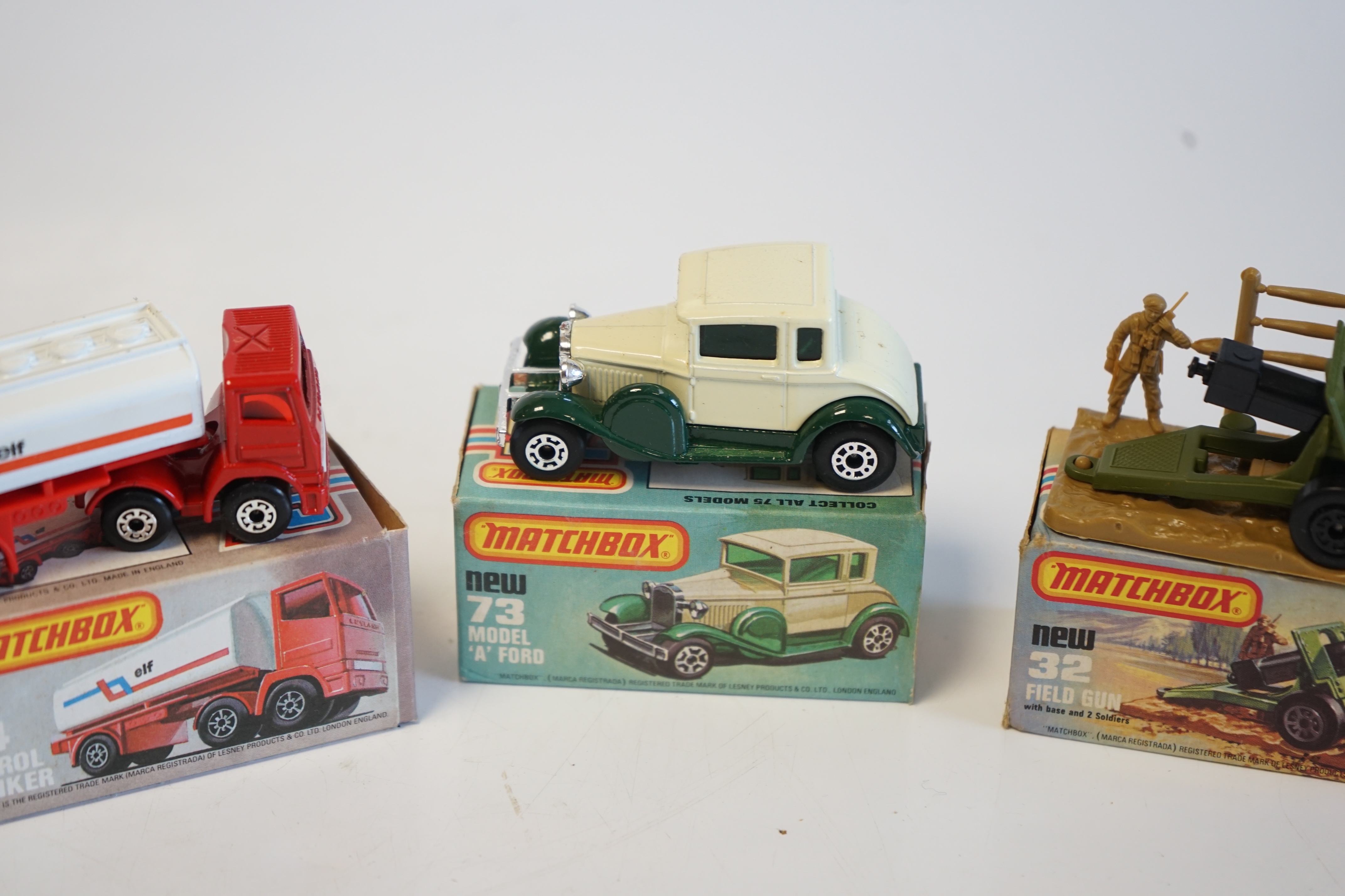 Seventeen boxed Matchbox Series 1-75 diecast vehicles including; 1; Dodge Challenger, 9; Ford RS 2000, 10; Plymouth Police Car and another, 11; Car Transporter, 14; Petrol Tanker and another, 28; Formula Racing Car, 32;